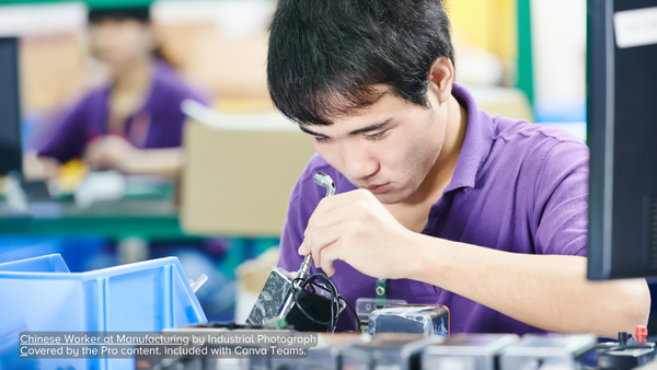 Chinese Worker at Manufacturing by Industrial Photograph Covered by the Pro content. included with Canva Teams.