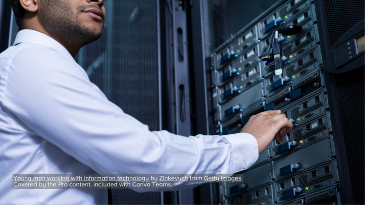 A young man working on a computer processor, representing information technology work.